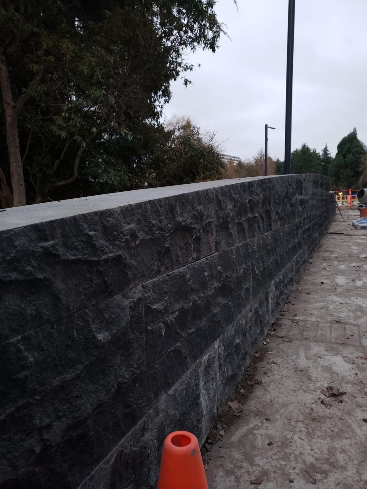 Hand-cut natural stone masonry wall